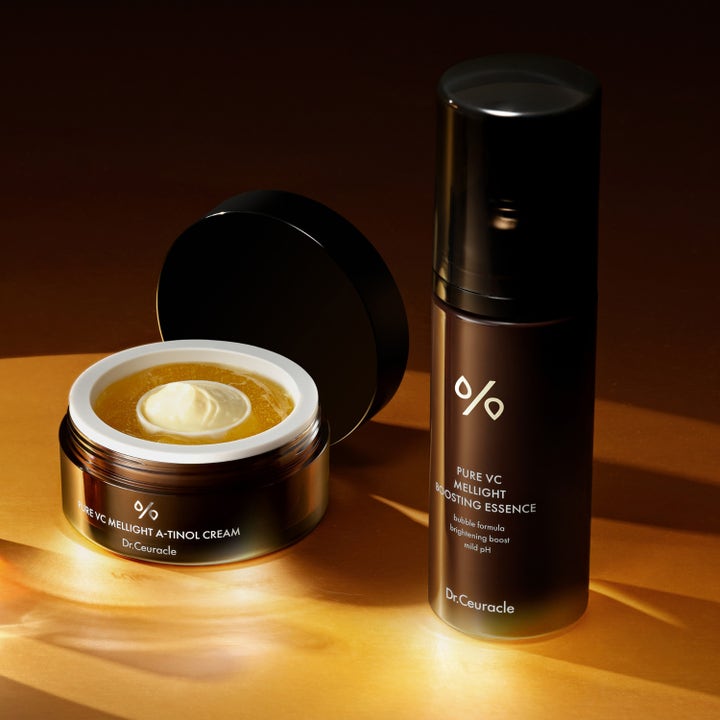 Dr. Ceuracle Pure VC Mellight A-tinol Cream 70 g lystergivande ansiktskräm i öppen mörk glasburk med krämig textur.