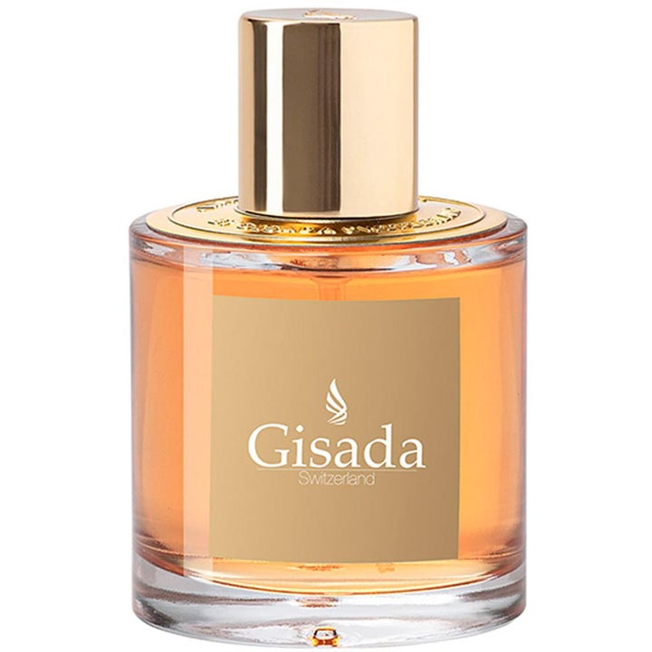 Gisada Ambassador Women 100ml eau de parfum dam i rund glasflaska med bärnstensfärgad vätska och guldlock