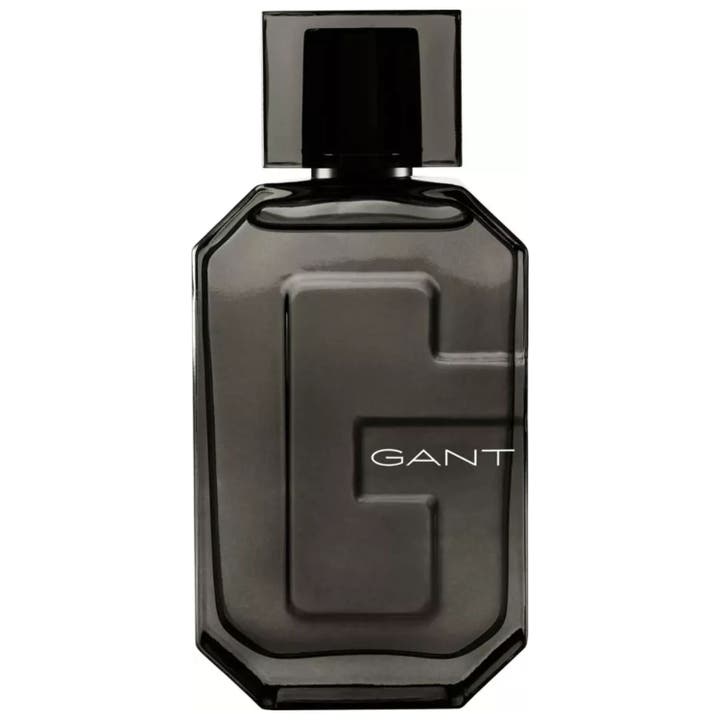GANT Midnight Eau de Parfum 100 ml herrparfym i en mörk glasflaska med ett stort präglat G och svart kork