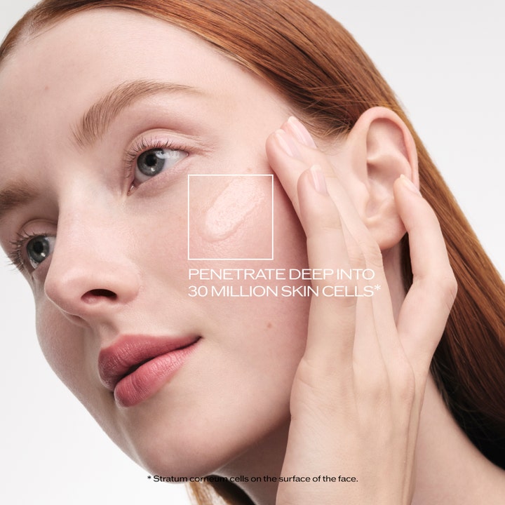 Shiseido Ultimune Power Infusing Concentrate 4.0 50 ml serum på en kvinnas kind för lyster