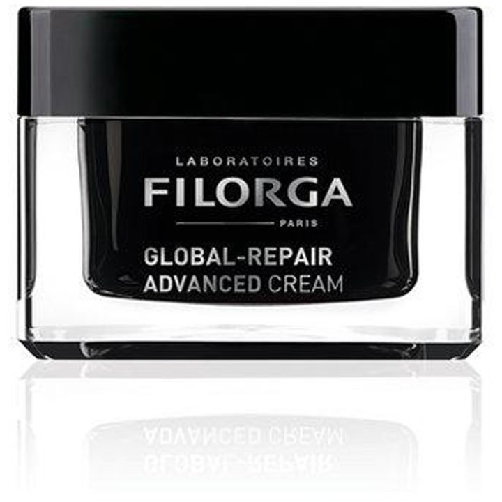 Filorga Global-Repair Advanced Cream filorga anti aging ansiktskräm i en lyxig glasburk med svart lock och innerdel.