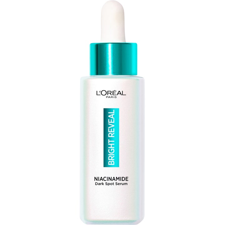 L'Oréal Paris Bright Reveal Niacinamide Serum ger effektiv pigmentreducering i en pärlemorskimrande flaska med turkos kork.