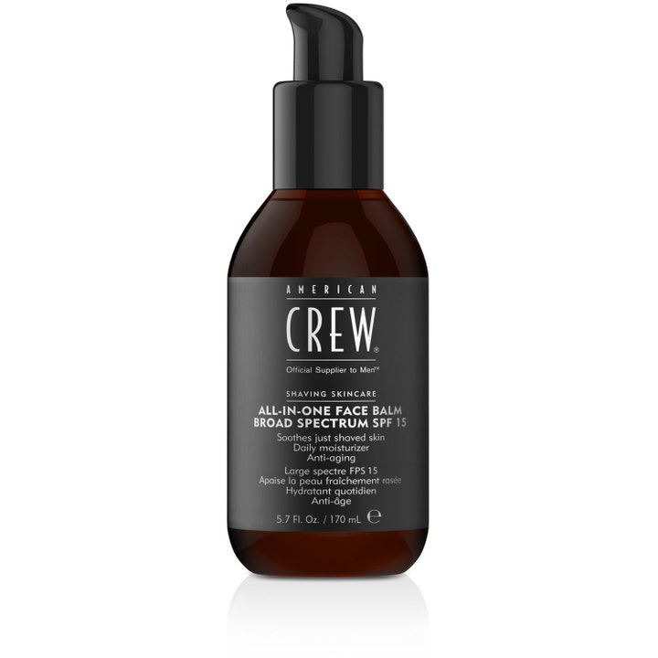 American Crew All-In-One Face Balm 170 ml lugnande aftershave i mörk bärnstensfärgad flaska med svart pump.