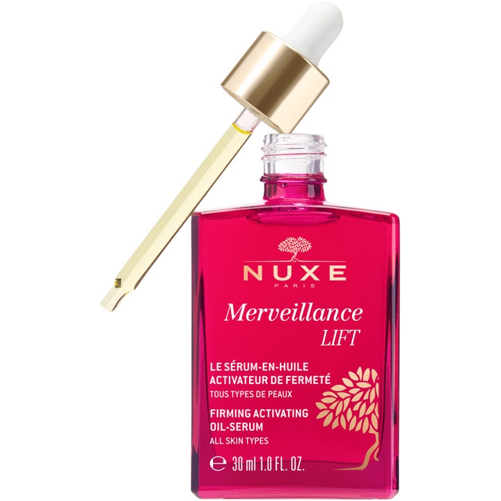 Nuxe Merveillance LIFT 30 ml firmande serum i röd glasflaska med öppen pipett som visar gul ansiktsolja antiaging