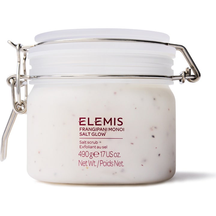 Elemis Frangipani Monoi Salt Glow 490 g saltskrubb för aromaterapi exfoliering i vit glasburk med metallbygel.