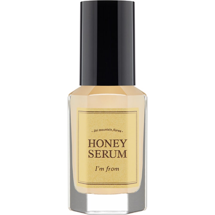 I'm From Honey Serum fuktgivande ansiktsserum med honung i en facetterad glasflaska med svart kork och guldgul etikett.