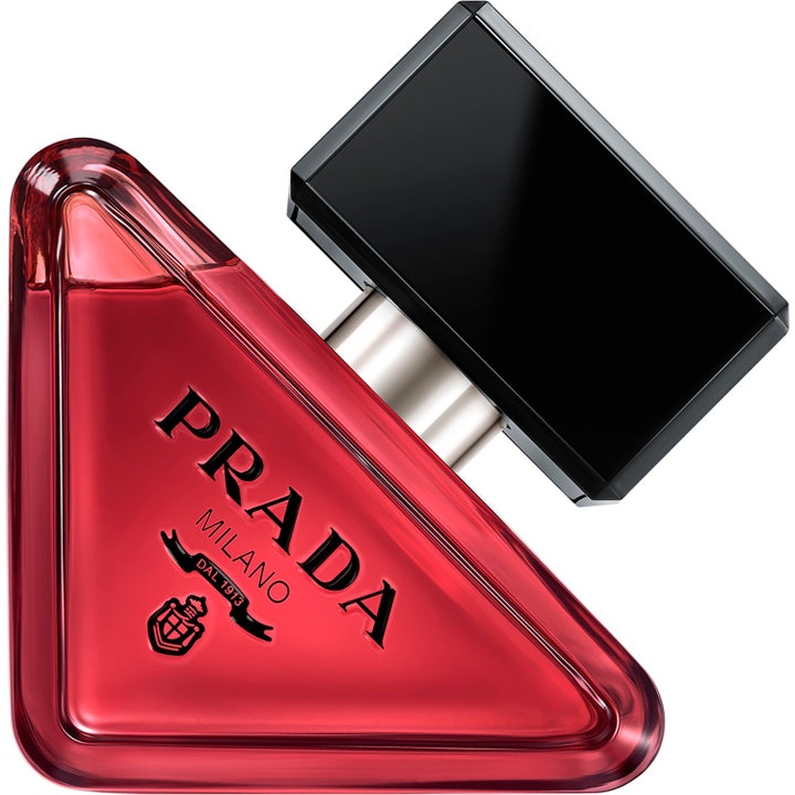 Prada Paradoxe Radical Essence 30 ml gourmand parfym dam i en triangulär glasflaska med mörkt rosa vätska och svart lock