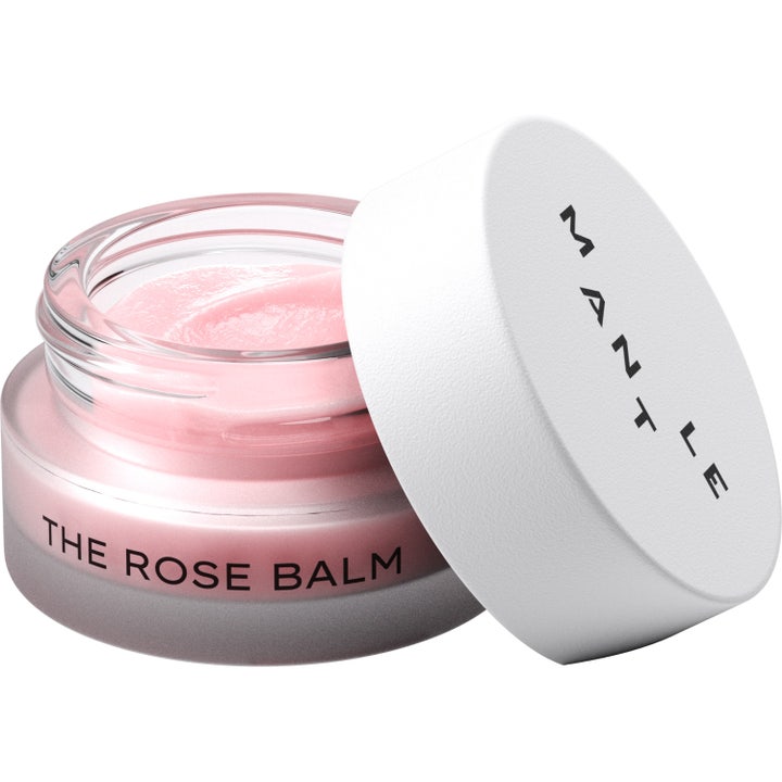 MANTLE The Rose Balm 15 ml utjämnande balm visar en krämig och glansig ljusrosa textur för ansiktet
