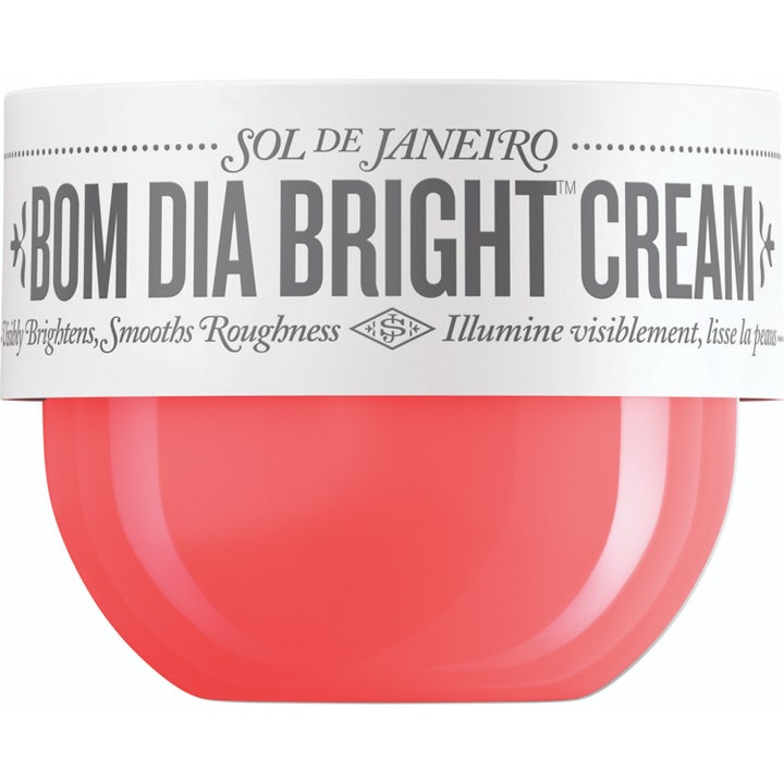 Sol de Janeiro Bom Dia Bright Cream 240 ml aha kräm ojämn hudton ger lyster i en korallfärgad burk med vitt lock.