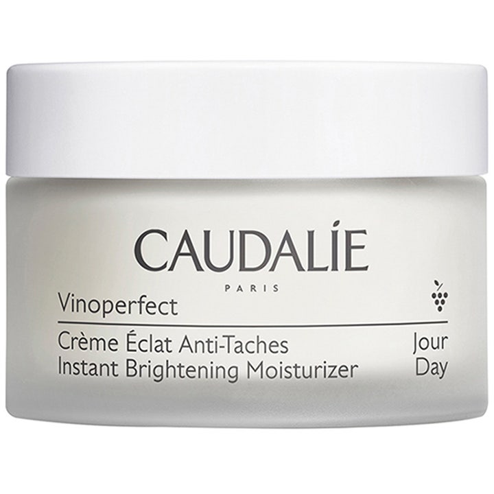 Caudalie Vinoperfect Instant Brightening Moisturizer lysterkräm för fläckborttagning ansikte i vit frostad glasburk