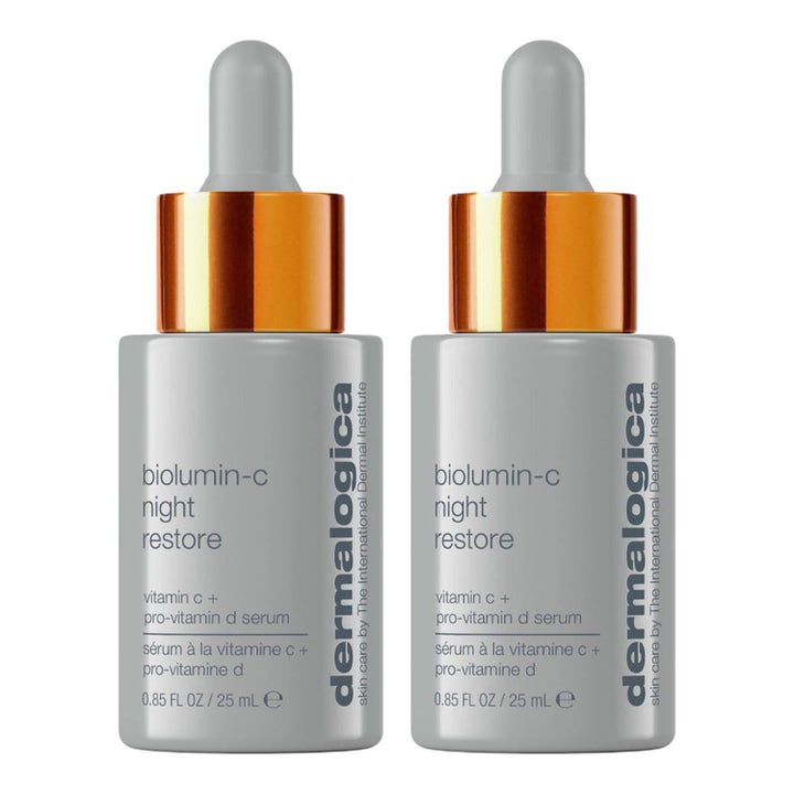Dermalogica BioLumin-C Night Restore 25 ml nattserum i två grå flaskor med orange metalldetaljer och pipett