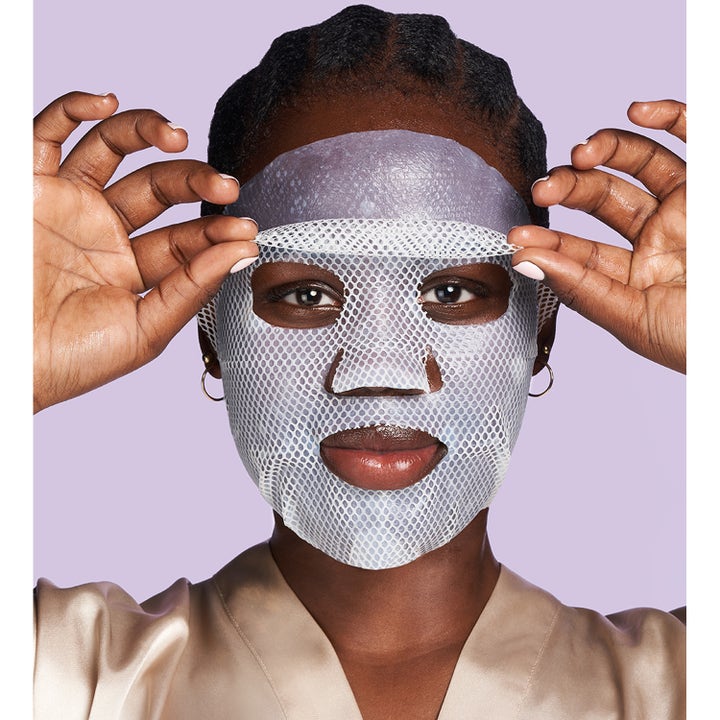 Exuviance Pick-Me-Up Plumping Mask 20 g plumpande sheet mask som ger fukt och appliceras med ett vitt nätmönster