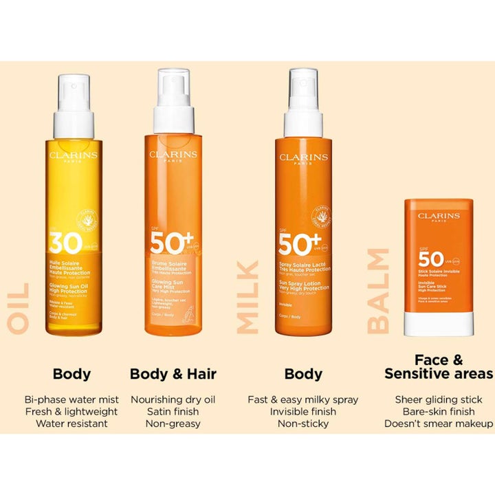 Clarins Glowing Sun Care Mist SPF50+ 150 ml icke-kladdig solspray för kropp och hår i orange flaska som ger satinfinish.