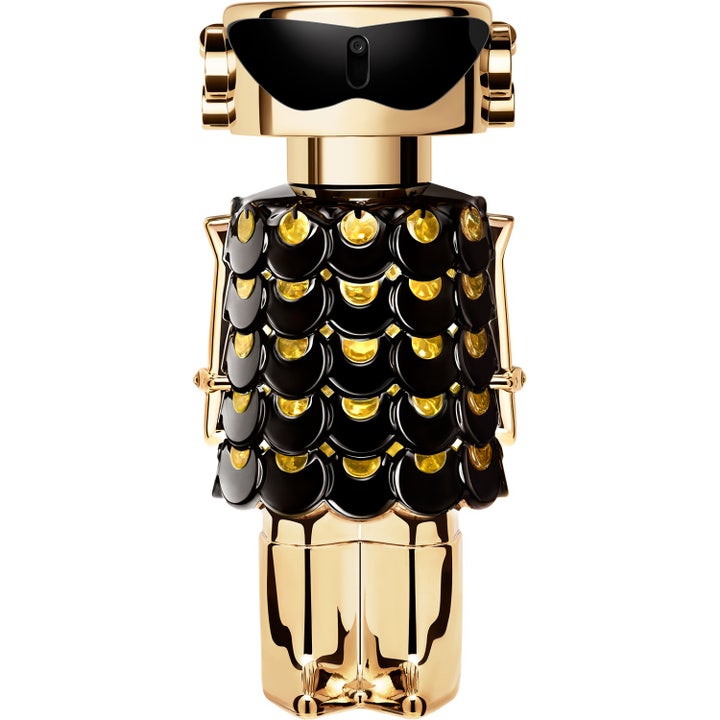 Rabanne Fame Le Parfum 80 ml träig parfym dam i en guldflaska formad som en robot med svart klänning och solglasögon