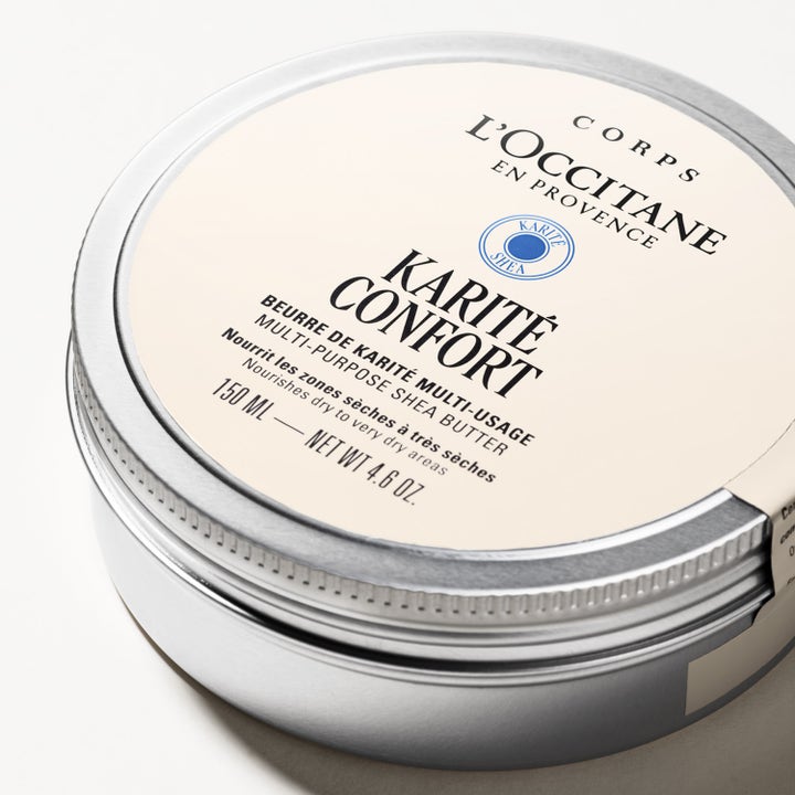 L'Occitane Multi-Purpose Shea Butter 150 ml ekologisk hudkräm med sheasmör i en rund silverfärgad metallburk.