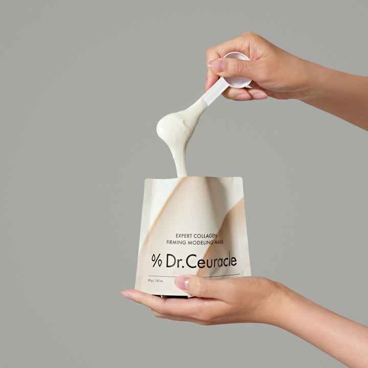 Dr. Ceuracle Expert Collagen Firming Modeling Mask 30 g ansiktsmask i påse med krämig vit textur.