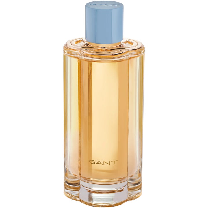 GANT Sunset Club Eau de Parfum 100 ml parfym i räfflad glasflaska med gyllene vätska och ljusblå kork