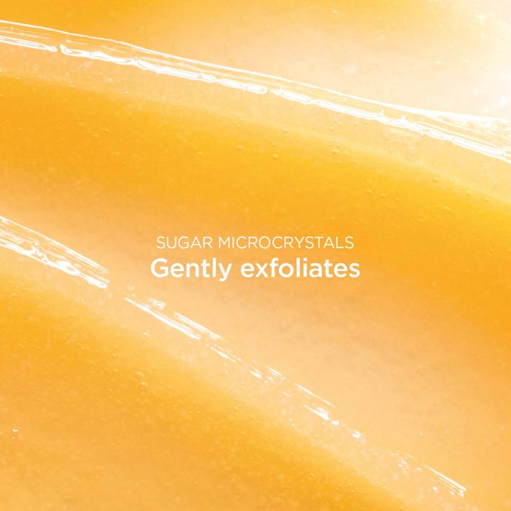 Clarins Comfort Scrub Nourishing Oil Scrub 50 ml ansiktsskrubb med gul gelkonsistens och sockerkristaller.
