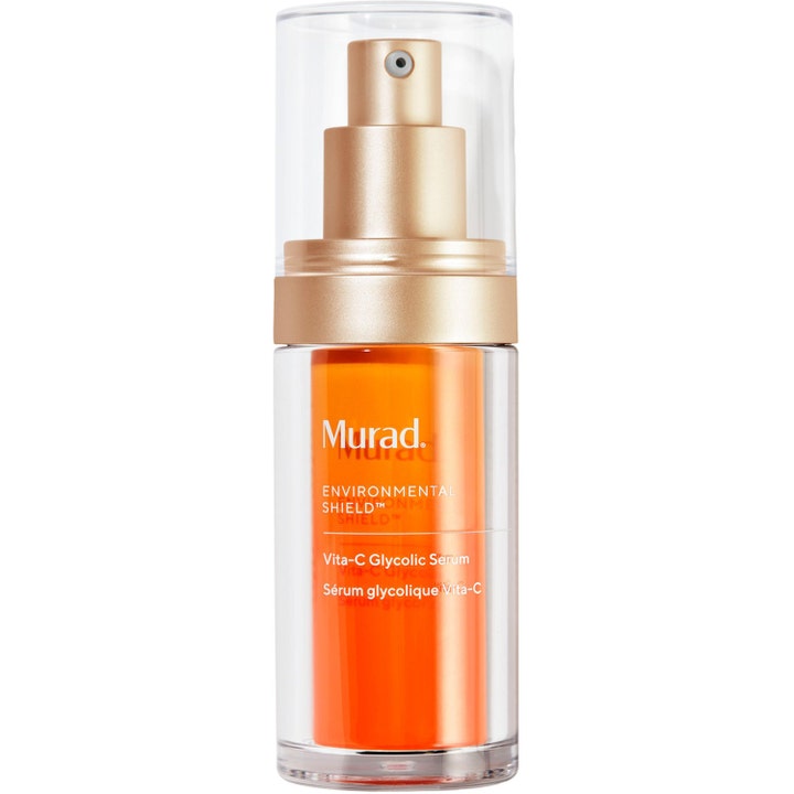 Murad Vita-C Glycolic Serum 30 ml uppljusande serum med glykolsyra i genomskinlig flaska med orange kärna och guldpump.