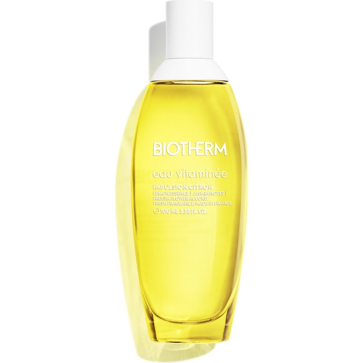 Biotherm Eau Vitaminée Eau de Fraiche 100 ml lätt parfym body mist i oval glasflaska med klar gul vätska och vitt lock