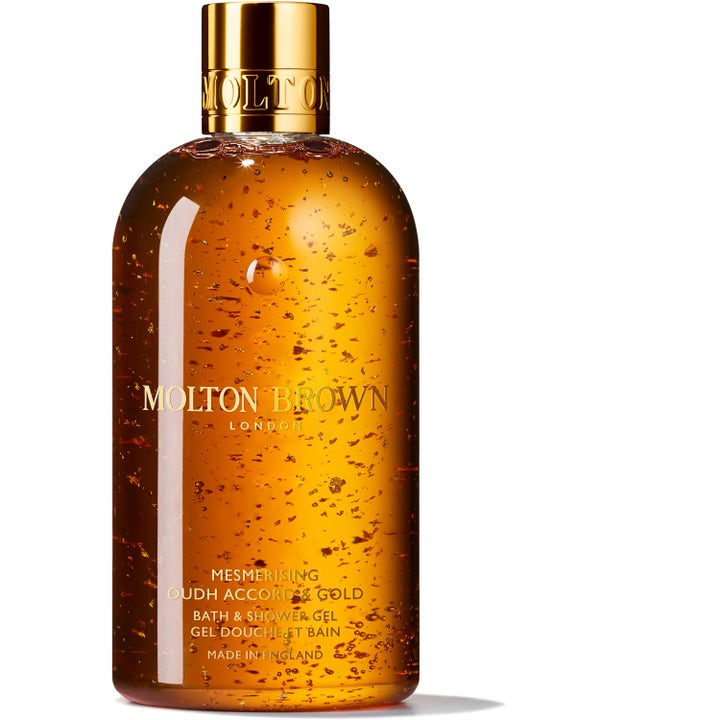 Molton Brown Mesmerising Oudh Accord & Gold 300ml duschgel premium med guld och oud parfym i flaska med guldlock.