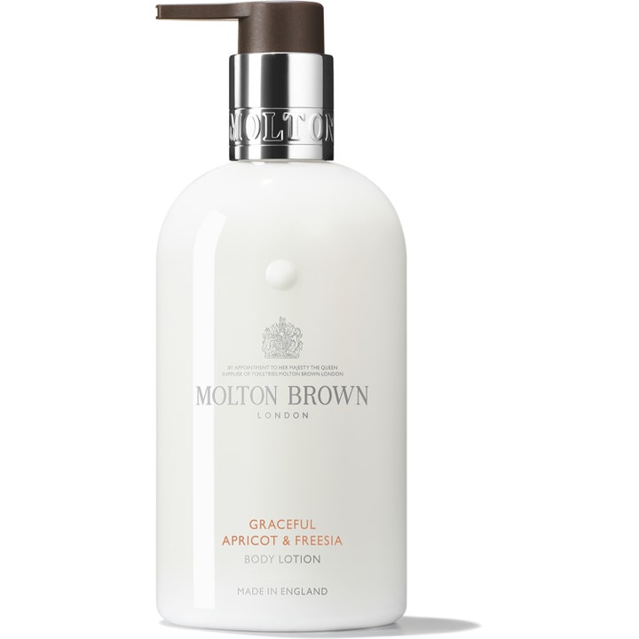 Molton Brown Graceful Apricot & Freesia 300 ml parfymerad lyxlotion med aprikosolja i vit flaska med silverpump.
