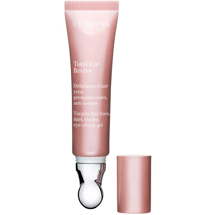 Clarins Total Eye Revive 15 ml anti-aging ögonkräm för mörka ringar i rosa tub med svalkande metallapplikator.