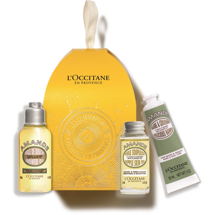 L'Occitane Almond Kit 3 delar mjukgörande kroppsvård med mandelolja i gul presentask med små flaskor och grön tub