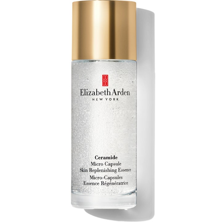 Elizabeth Arden Ceramide Micro Capsule Skin Replenishing Essence fuktserum i flaska med guldkork och synliga mikrokapslar.