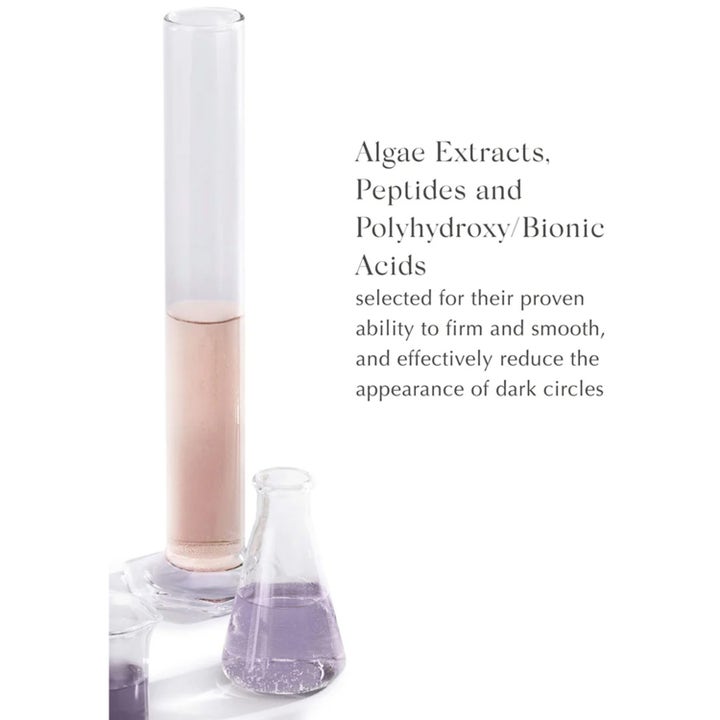 Exuviance Bright Eyes Dark Circle Corrector 15 g uppljusande ögonkräm mot mörka ringar med peptider och alger i lab-glas.