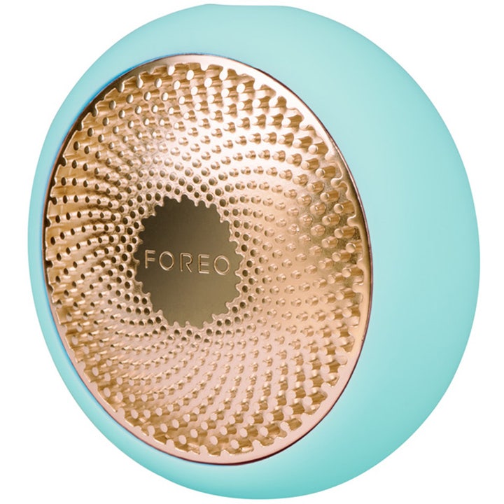 FOREO UFO 2 Mint beautytech maskenhet för foreo ansiktsbehandling i mintgrön silikon med en mönstrad guldplatta