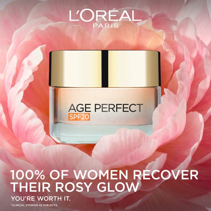 L'Oréal Paris Age Perfect Golden Age 50 ml dagkräm med SPF20 ger lyster i glasburk omgiven av en rosa blomma