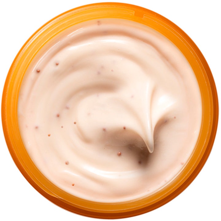 Origins GinZing Glow-Boosting Mask 75 ml ginseng mask ger ansiktslyster med krämig persikofärgad textur i en orange burk.