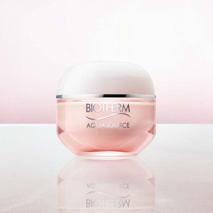 Biotherm Aquasource Cica Nutri 30 ml återfuktande dagkräm i en rund rosa glasburk med vitt lock.