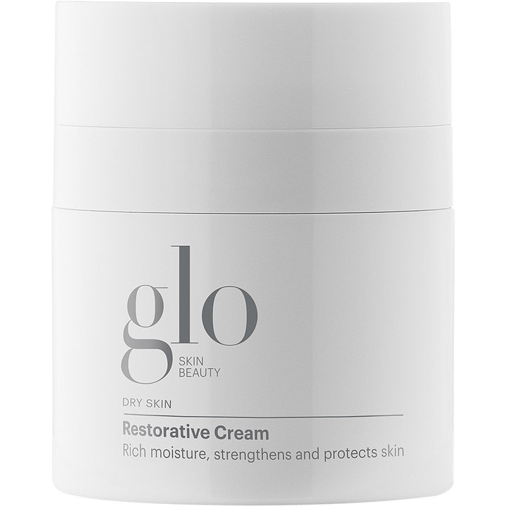 Glo Skin Beauty Restorative Cream stärkande återfuktande ansiktskräm i en stilren vit burk för torr hy.