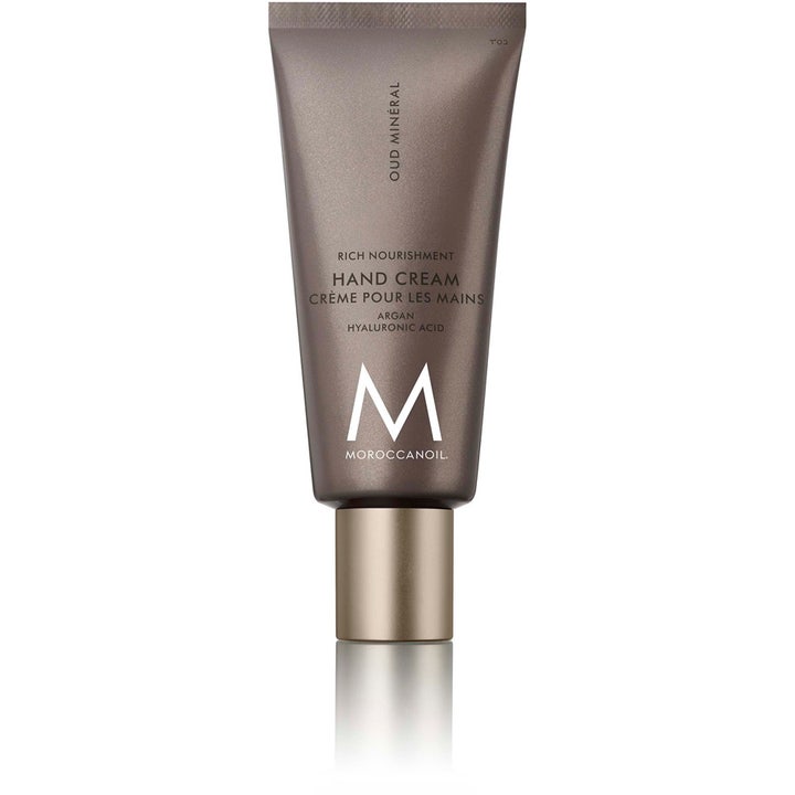 Moroccanoil Hand Cream Oud Minéral exklusiv handkräm med hyaluronsyra argan olja i en matt bronstonad tub