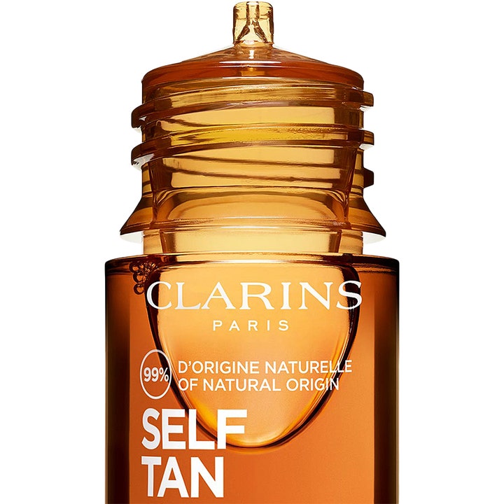 Clarins Radiance Plus Golden Glow Booster Face 15 ml ansiktsdrops brun utan sol i bärnstensflaska ger naturlig solkysst hy.