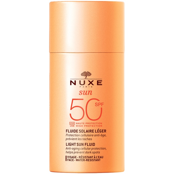 Nuxe Sun Light Sun Fluid SPF 50 50ml solskydd som ger anti-age skydd i en persikofärgad flaska med matchande lock