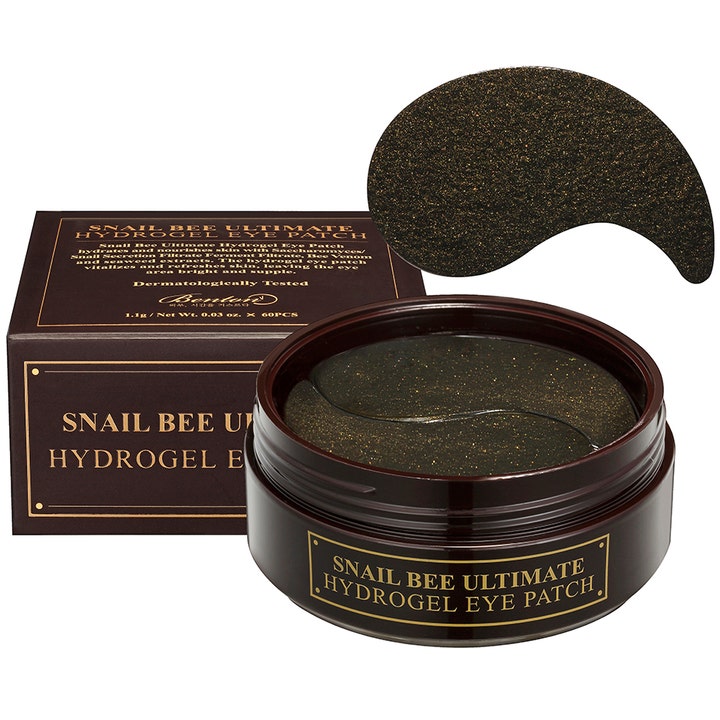 Benton Snail Bee Ultimate Hydrogel Eye Patch 60 st benton ögonmask med snigelsekret i brun burk med guldiga patches.