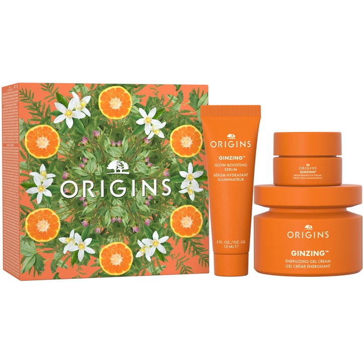 Origins GinZing citrus hudvårds kit med energigivande kräm och ansiktsserum för glow i orangea burkar och tub.