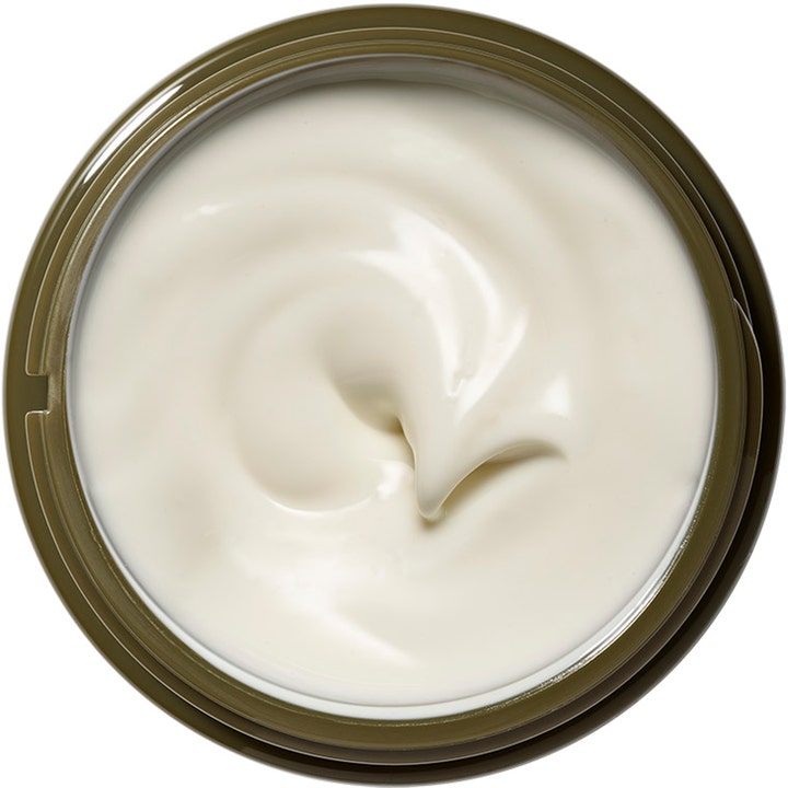Origins Plantscription Powerful Lifting Face Cream 50 ml ansiktslyftkräm med fyllig vit textur och virvel i en grön burk.