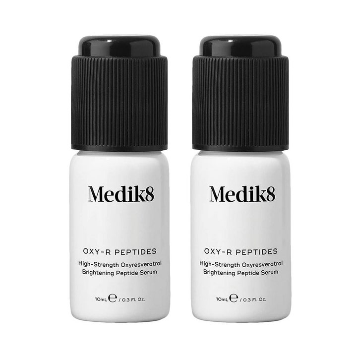 Medik8 Oxy-R Peptides 2x10ml hyperpigmentering peptidserum med oxyresveratrol i två vita flaskor med svarta lock.
