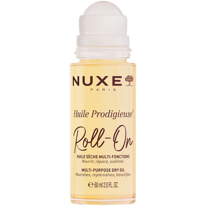 Nuxe Huile Prodigieuse Roll-On 60 ml fuktgivande rollon med gyllene skönhetsolja i en transparent flaska.