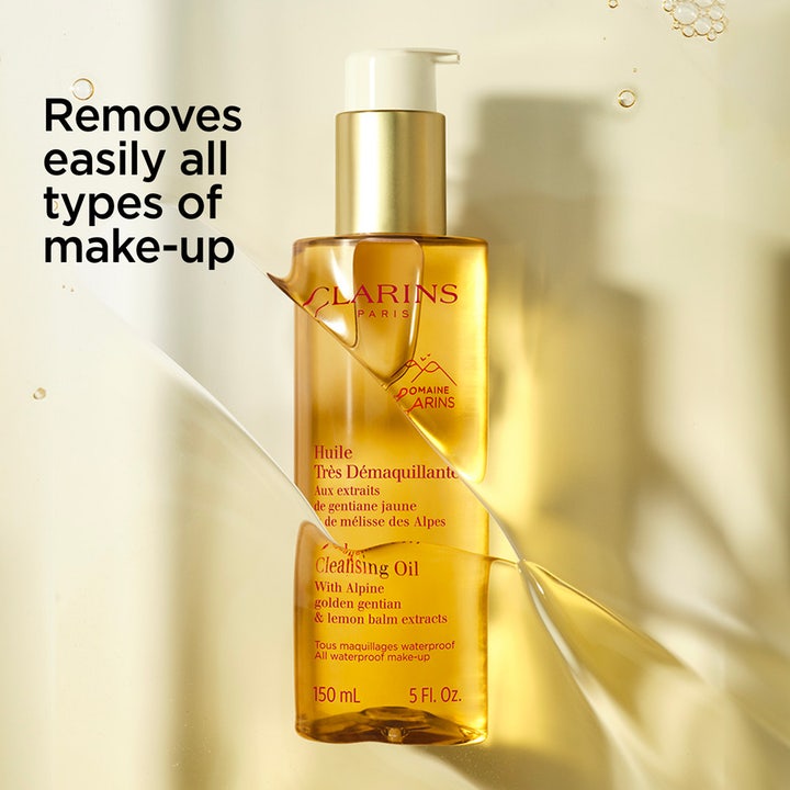 Clarins Total Cleansing Oil 150 ml rengöringsolja ansikte i guldig pumpflaska för effektiv sminkborttagning