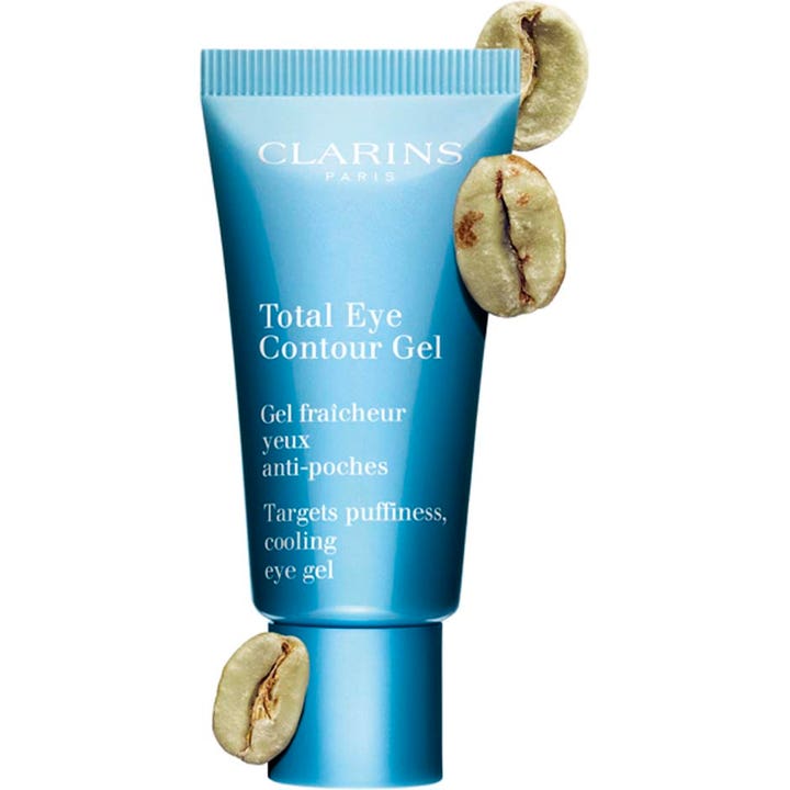 Clarins Total Eye Gel 20 ml anti-svullnad återfuktande ögongel i blå tub omgiven av kaffebönor.
