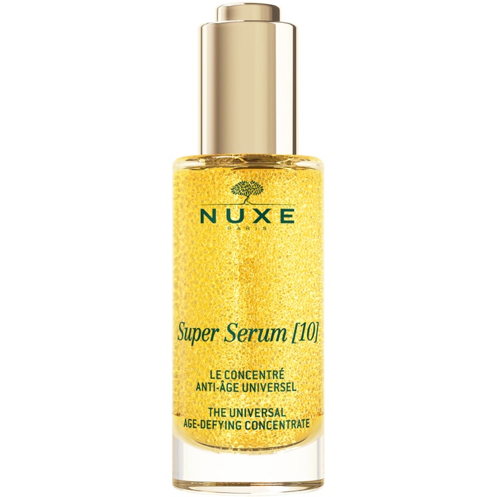 Nuxe Super Serum [10] 30 ml anti-åldring hyaluronsyra hudvård i glasflaska med guldlock och gula mikropärlor