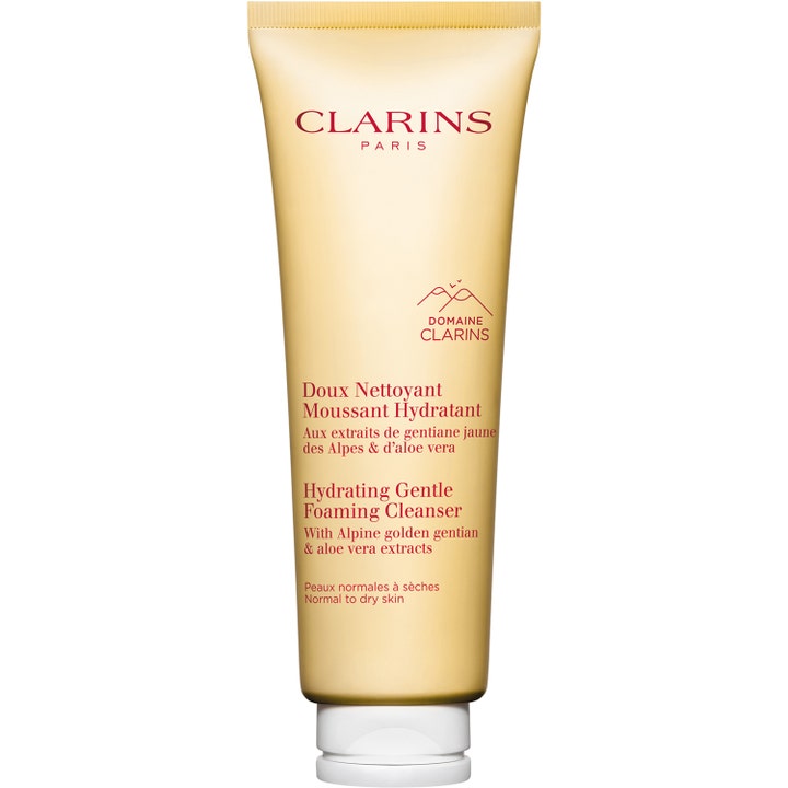 Clarins Hydrating Gentle Foaming Cleanser återfuktande aloe vera rengöring i en lyxig guldfärgad tub med vit kork.