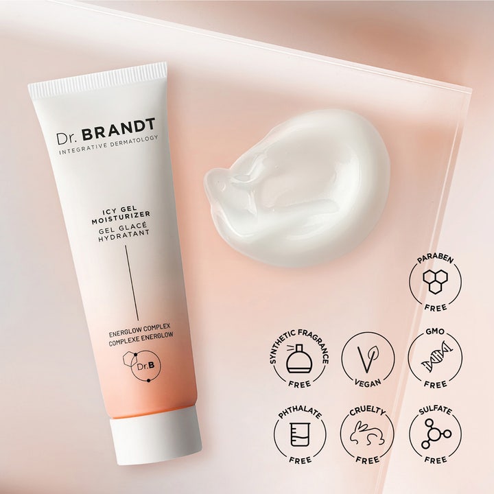 Dr Brandt iD-STRESS Fatigue Fighting Eye Gel 15 g vegansk ögonkräm med vit geltextur bredvid en persikofärgad tub.