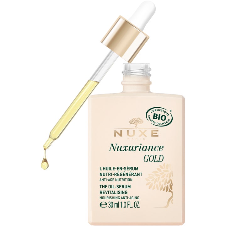 Nuxe Nuxuriance Gold 30 ml förnyande ansiktsserum i glasflaska med pipett som visar gyllene oljedroppar