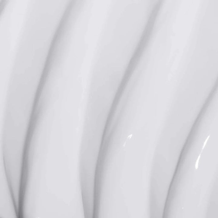 Dermalogica AGE smart Duo Super Rich Repair närande hudvård med en fyllig och glansig vit krämkonsistens.